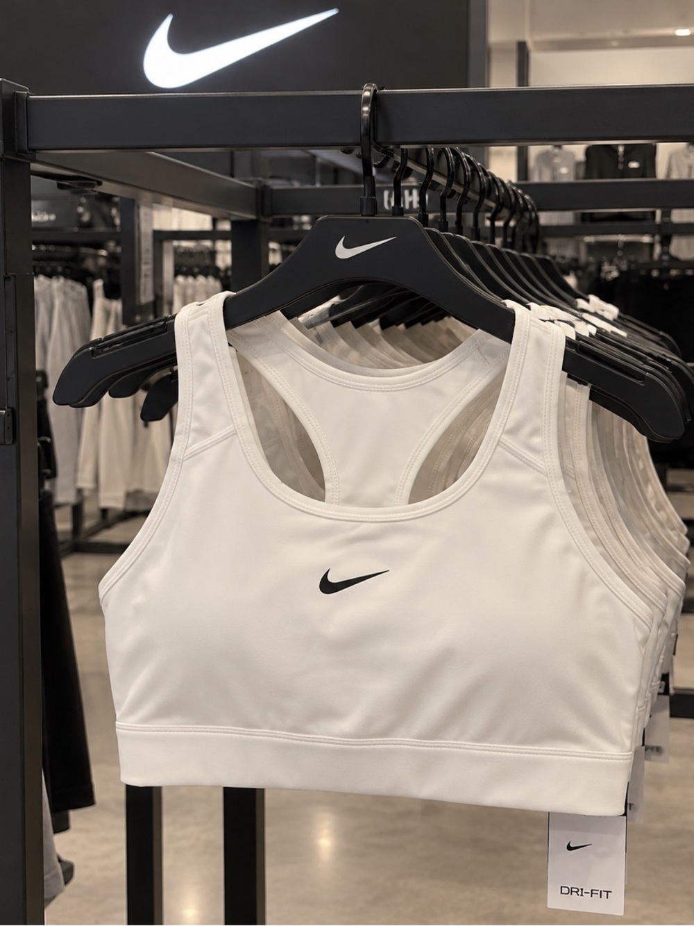 Nike White Dri-FIT Racerback Sports Bra with Black Swoosh